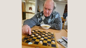 Essex Resident becomes draughts care home champion on his first time playing